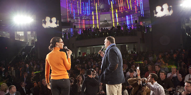 Carla and Jose on stage with crowd