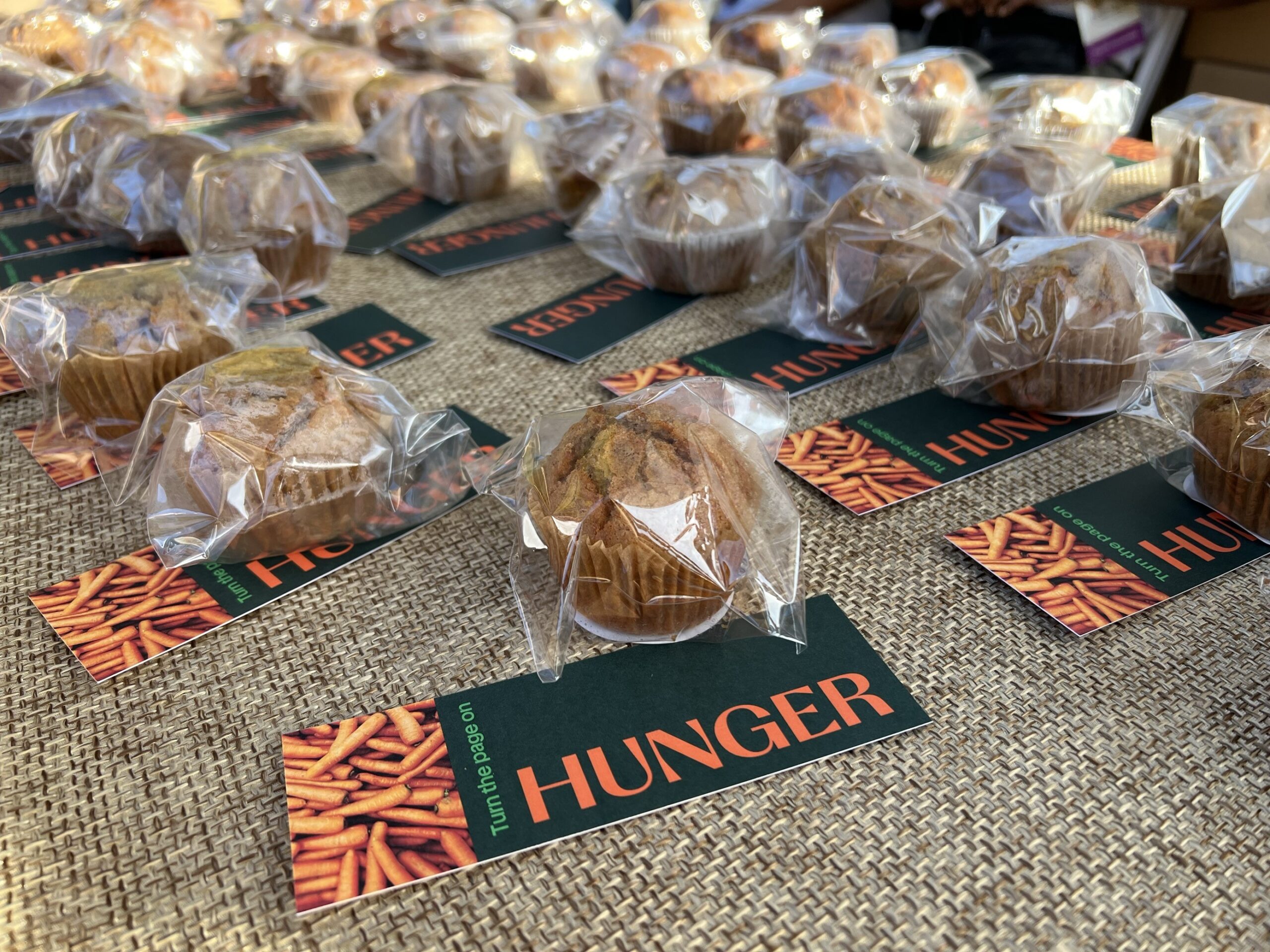 DCCK & Instacart handed out Carrot Pineapple muffins and Turn the Page on Hunger bookmarks at the White House's Hallo-READ event.