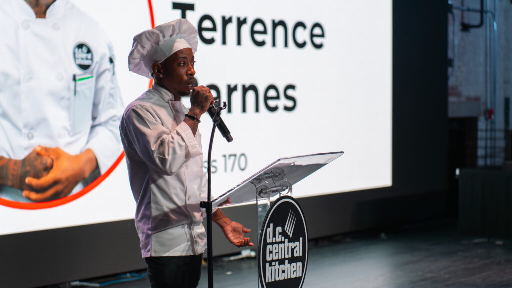 Terrence Barnes speaking to his fellow Culinary Job Traning graduates.