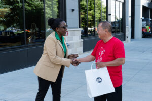 Colonel Charlette K. Woodard and a DoorDasher