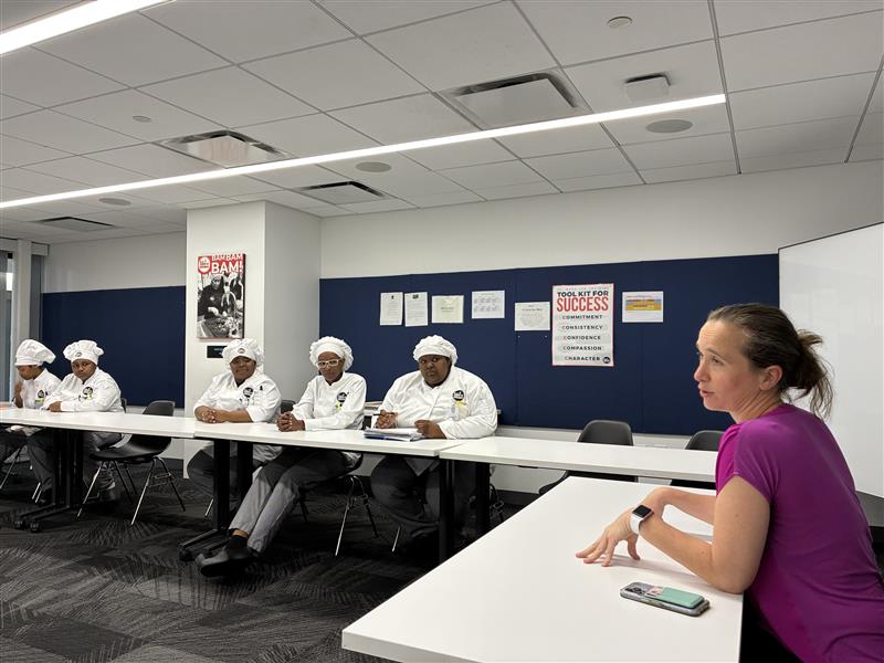 Laura Calderone speaking to Culinary Job Training students