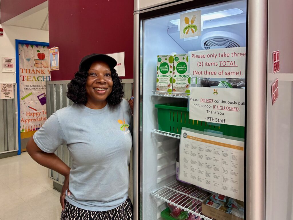 Connie Williams and a Plenty to Eat grab-and-go refrigerator