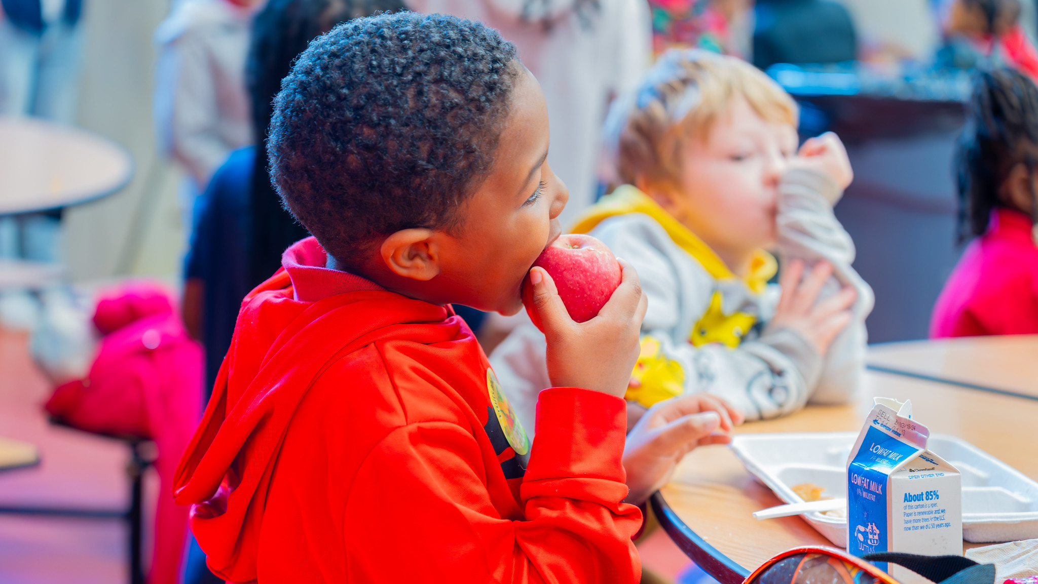 A student eating an apple