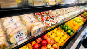 Healthy Corners' fresh fruits on a corner store shelf
