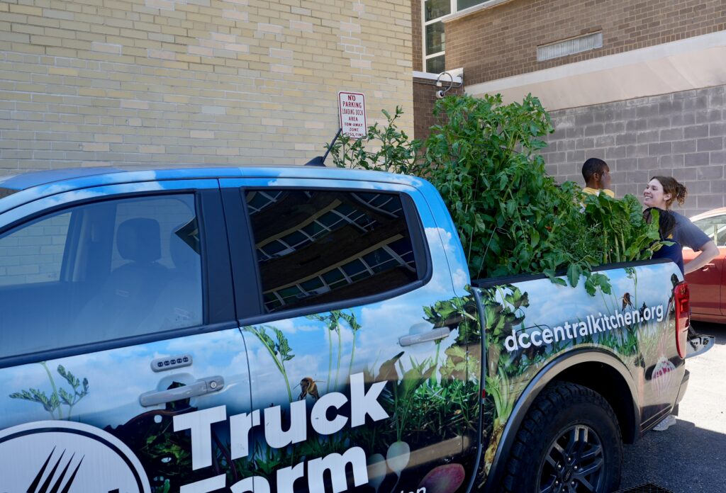 A child at the DC Central Kitchen Farm Truck